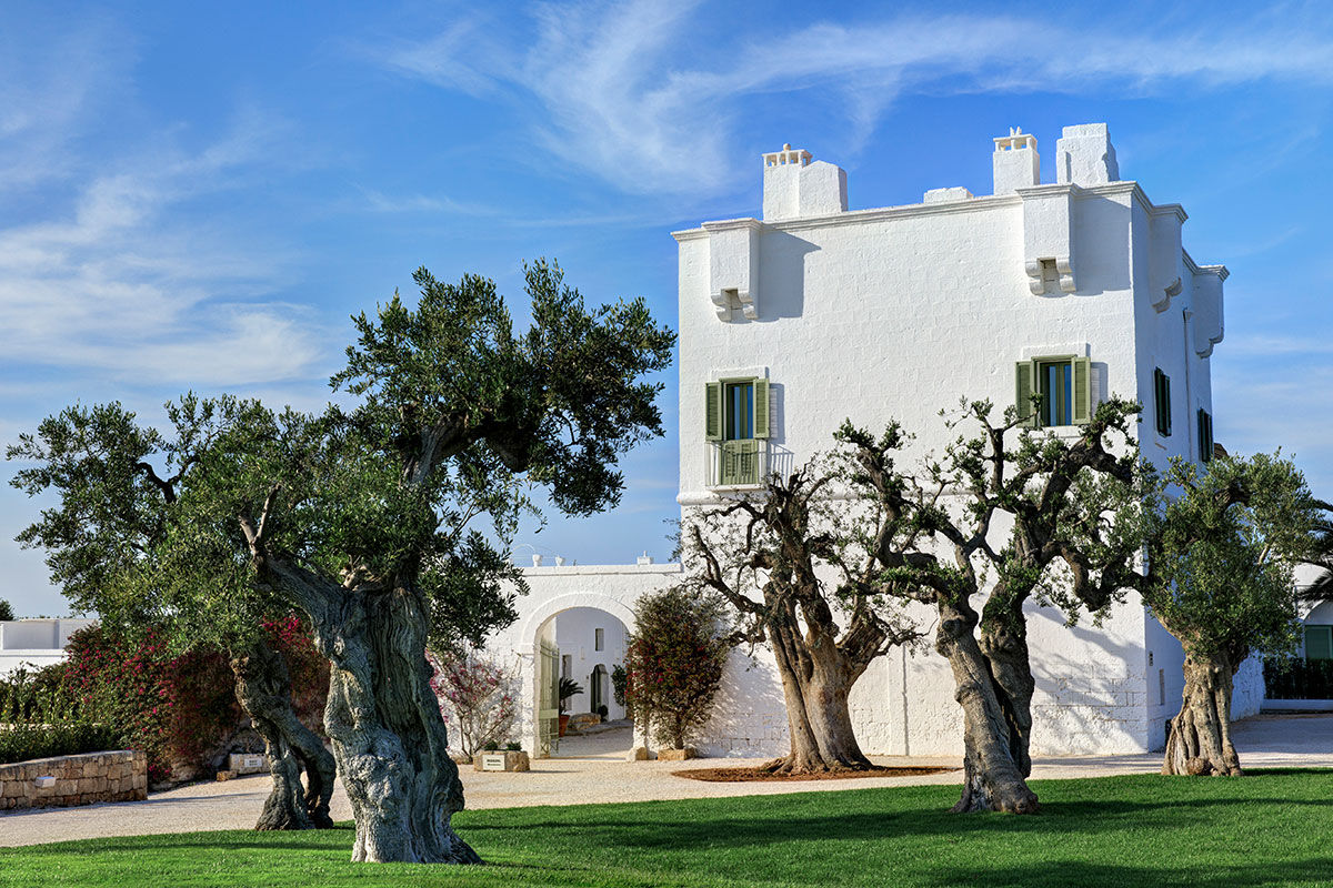 <b>Masseria Torre Maizza, Savelletri</b> - Looking over the surrounding olive groves to the Adriatic Sea, this whitewashed hotel is a renovated 16th century masseria. The restaurant uses local ingredients, the property boasts a private beach club, spa, and golf course, and you’re only a short shuttle away from the quaint fishing town of Savelletri.