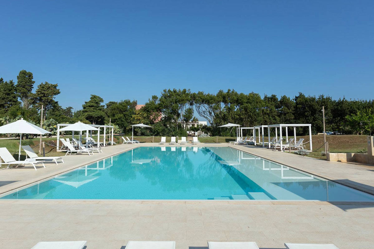 <b>Masseria Mongio Dell'Elefante, Otranto</b> - Although off the beaten track and surrounded by fields, the Masseria Mongio Dell’Elefante is only a 1-minute walk to Baia dei Turchi beach. Featuring exposed stone and recycled wood, this traditional farmhouse-turned-boutique hotel has an elegant charm to ease you into your vacation.