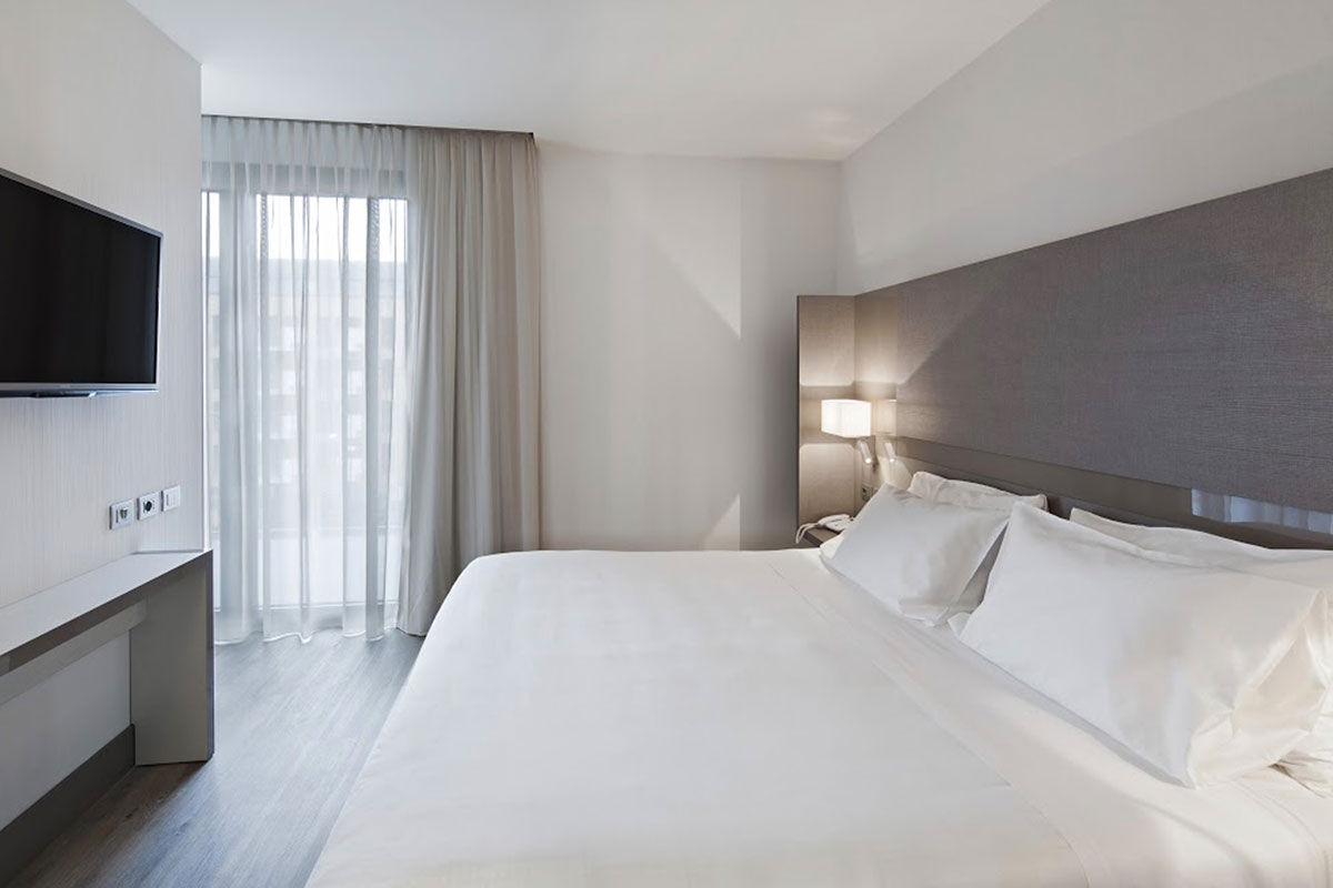 <b>NH Hotel, Parma</b> - Steps from the train station and just a short walk from the historic center of Parma, the NH is a gleaming new complex designed by famous Spanish architect, Oriol Bohigas. The contemporary rooms, fitness area, and stylish restaurant all make for a refined and exclusive experience.