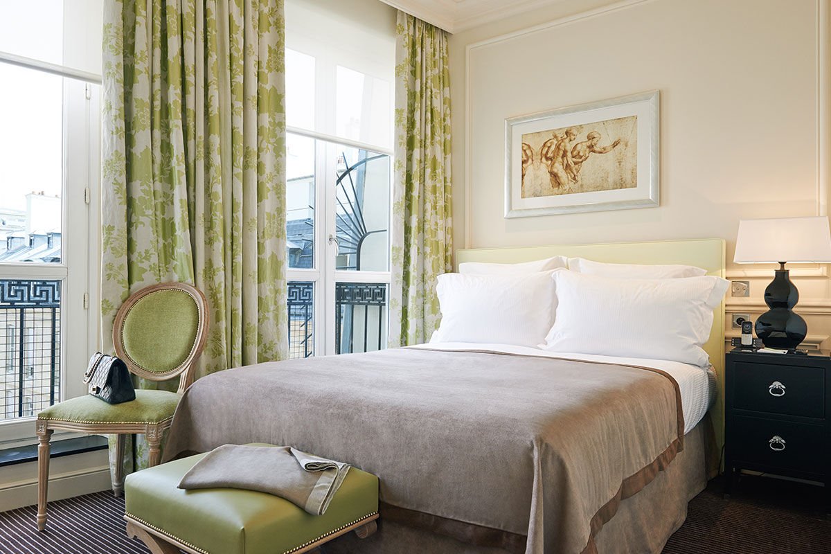 <b>Grand Hotel du Palais Royal</b> - Set opposite the Palais Royal and only a 2-minute walk to the Musee du Louvre, this posh hotel is centrally located for strolls down the Parisian streets. The Grand Hotel du Palais Royal is set within an 18th century building, making it the perfect home for its bright, luxe rooms and champagne toasts.