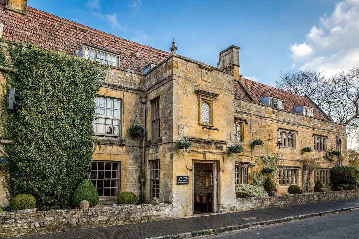 <b>The Manor House Hotel, Moreton-in-Marsh</b> - The Manor House Hotel and is a handsome 16th century retreat with stunning walled-in gardens featuring their famous mulberry tree. The stone architecture is enchanting, the rooms are styled in great taste, and several fireplaces make for a cozy environment. Finesse is here.