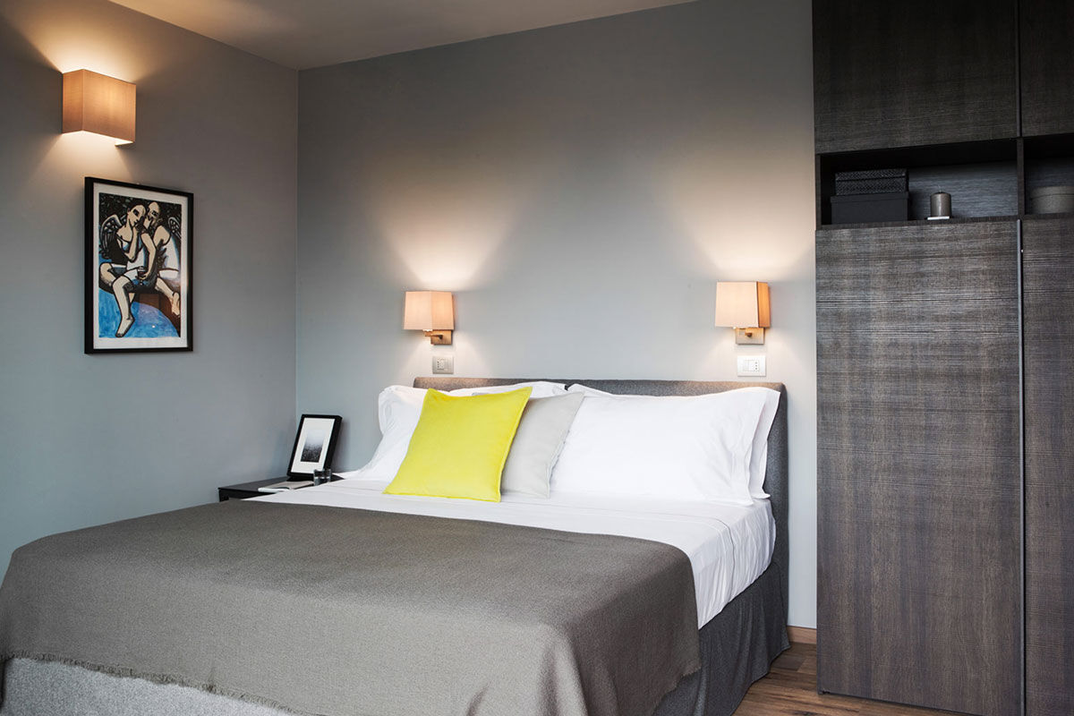 <b>Arborina Relais</b> - Surrounded by Barolo hill vineyards and sitting atop lush grounds, the Arborina Relais is a modern boutique hotel that offers luxury and style. The architectural lines, large windows and natural materials make it an experience hand in hand with nature.