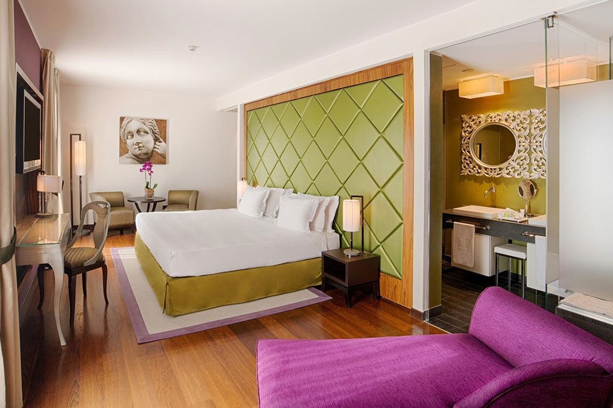 <b>NH Collection Taormina</b> - Modern and cool, the NH Collection Taormina features a roof-top terrace, cocktail bar and panoramic view of the Sicilian coast. The early 20th century architecture is stylish and adds to the polished Mediterranean feel.