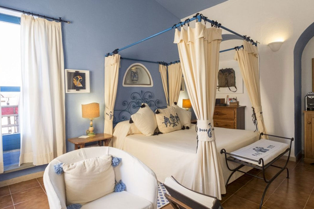 <b>Experience Hotel Su Gologone</b> - Hotel Su Gologone is the perfect escape for those who appreciate local art, food, wine and culture. Surrounded by the Supramonte mountaintops, this hotel has stunning sunset views; it hosts expert artists teaching classes on site, and showcases the bright colors and textiles of regional Sardinian crafts.