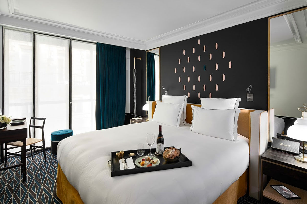 <b>Le Roch Hotel and Spa</b> - Characterized by a relaxed style with ultrachic décor this sophisticated hotel makes its mark on Paris’s luxury boutique scene. Moody jewel tone restaurant with velvet seating, outdoor patio café, lounge with a fireplace… Le Roch is doing it right.