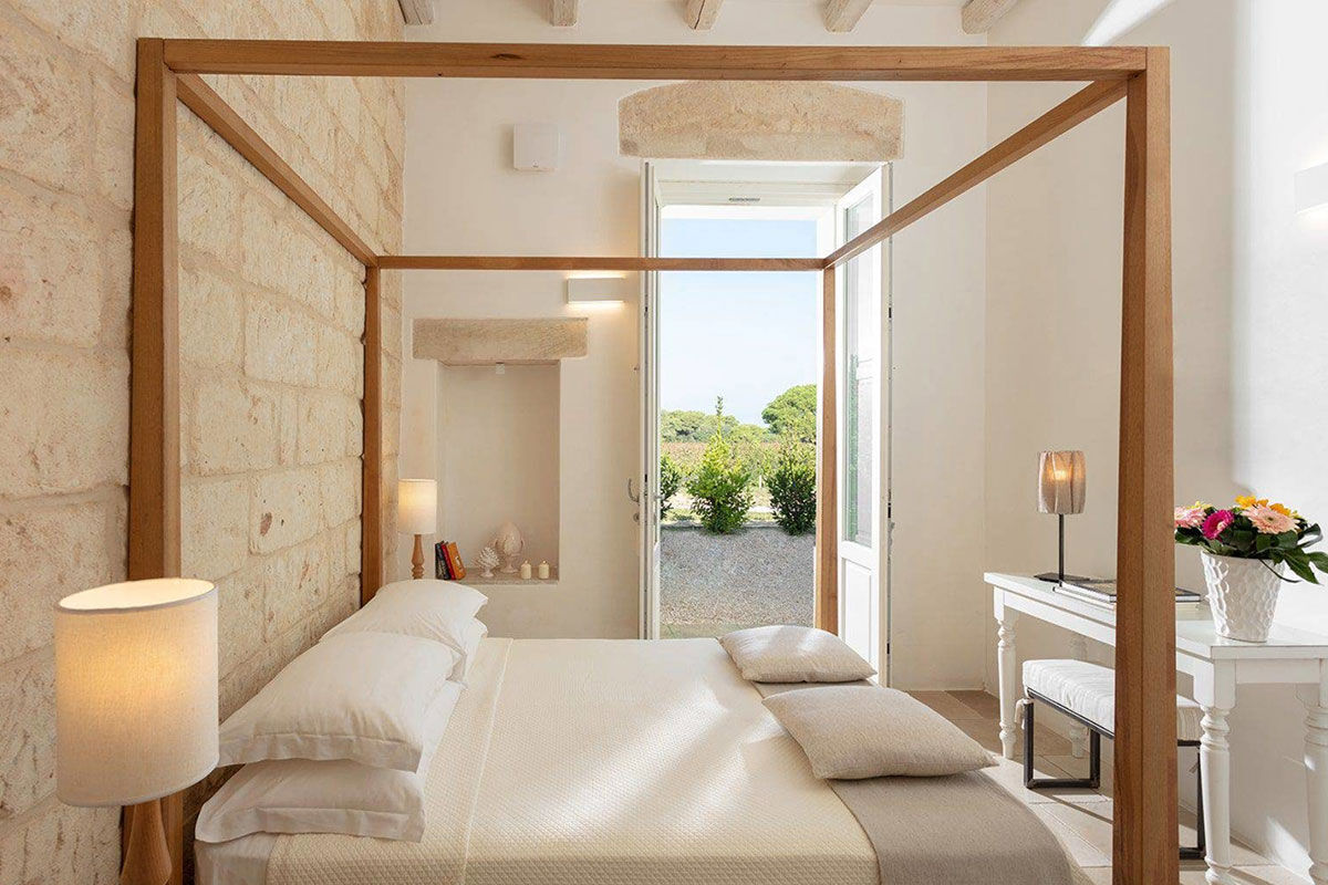 <b>Masseria Mongio Dell'Elefante, Otranto</b> - Although off the beaten track and surrounded by fields, the Masseria Mongio Dell’Elefante is only a 1-minute walk to Baia dei Turchi beach. Featuring exposed stone and recycled wood, this traditional farmhouse-turned-boutique hotel has an elegant charm to ease you into your vacation.