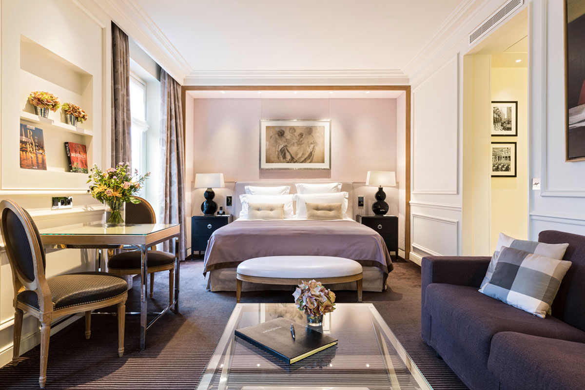 <b>Grand Hotel du Palais Royal</b> - Set opposite the Palais Royal and only a 2-minute walk to the Musee du Louvre, this posh hotel is centrally located for strolls down the Parisian streets. The Grand Hotel du Palais Royal is set within an 18th century building, making it the perfect home for its bright, luxe rooms and champagne toasts.