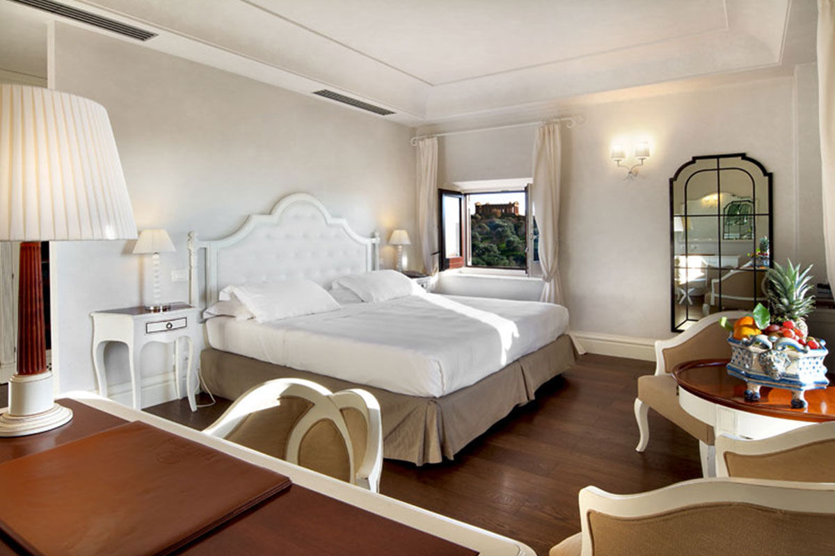 <b>Villa Athena, Agrigento</b> - With views of the Temple of Concordia (only 200 meters away) from nearly every corner of the hotel, this classy dwelling speaks for itself. The lush grounds, sophisticated rooms, pool, and terrace restaurant bring elegance to this UNESCO World Heritage Site.