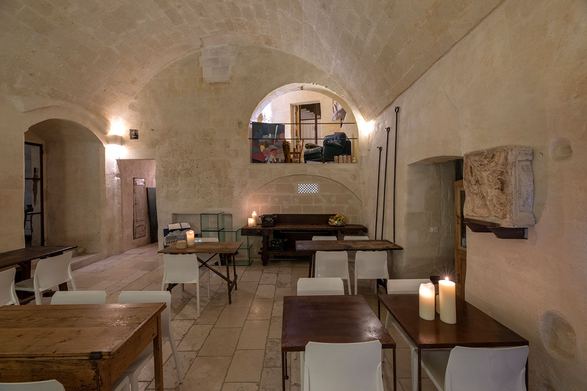 <b>Corte San Pietro, Matera</b> - Cave dwellings, tufa stone courtyards and herb gardens are all things you’ll find when arriving at the Corte San Pietro. Quite like a dream, you will sleep in a plush cave room with a design worthy of an architectural magazine.