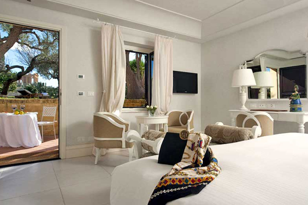 <b>Villa Athena, Agrigento</b> - With views of the Temple of Concordia (only 200 meters away) from nearly every corner of the hotel, this classy dwelling speaks for itself. The lush grounds, sophisticated rooms, pool, and terrace restaurant bring elegance to this UNESCO World Heritage Site.