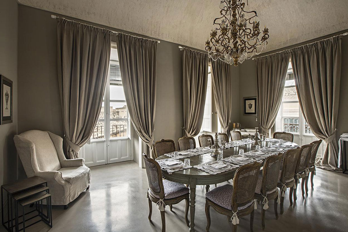 <b>Seven Rooms Villadorata, Noto</b> - Having once been home to a prince, there’s a stately air to Seven Rooms Villadorata with its floor to ceiling windows, gilded tiles and frescoed ceilings. The cocktail bar is swanky, the restaurant has vaulted ceilings and fine fabrics are used throughout the property for an especially luxurious palette.