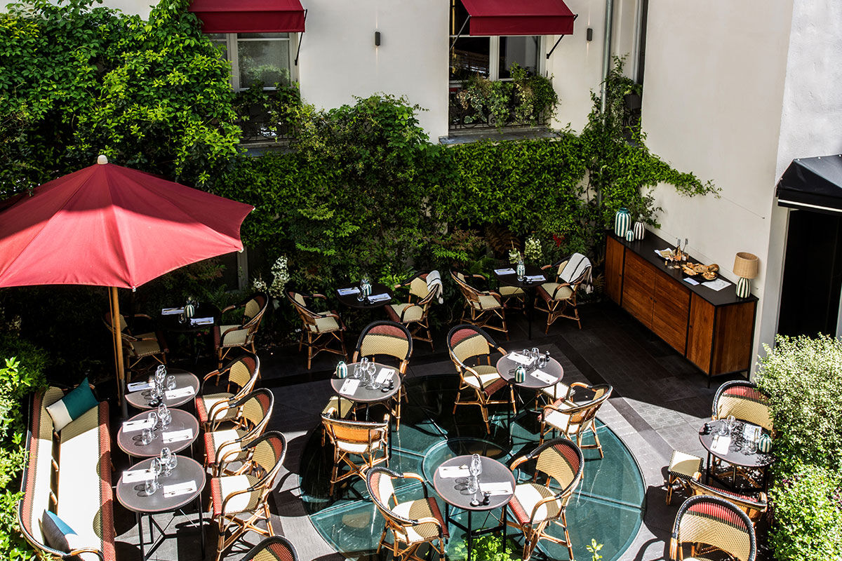 <b>Le Roch Hotel and Spa</b> - Characterized by a relaxed style with ultrachic décor this sophisticated hotel makes its mark on Paris’s luxury boutique scene. Moody jewel tone restaurant with velvet seating, outdoor patio café, lounge with a fireplace… Le Roch is doing it right.