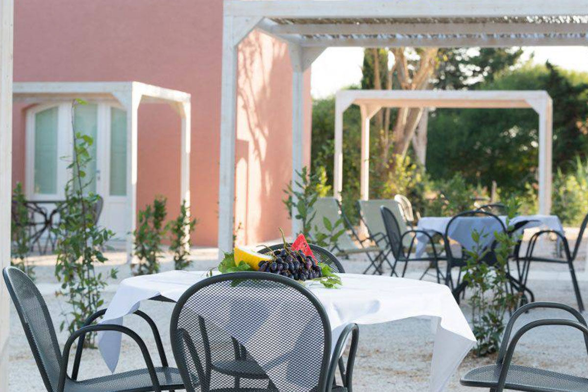 <b>Masseria Mongio Dell'Elefante, Otranto</b> - Although off the beaten track and surrounded by fields, the Masseria Mongio Dell’Elefante is only a 1-minute walk to Baia dei Turchi beach. Featuring exposed stone and recycled wood, this traditional farmhouse-turned-boutique hotel has an elegant charm to ease you into your vacation.