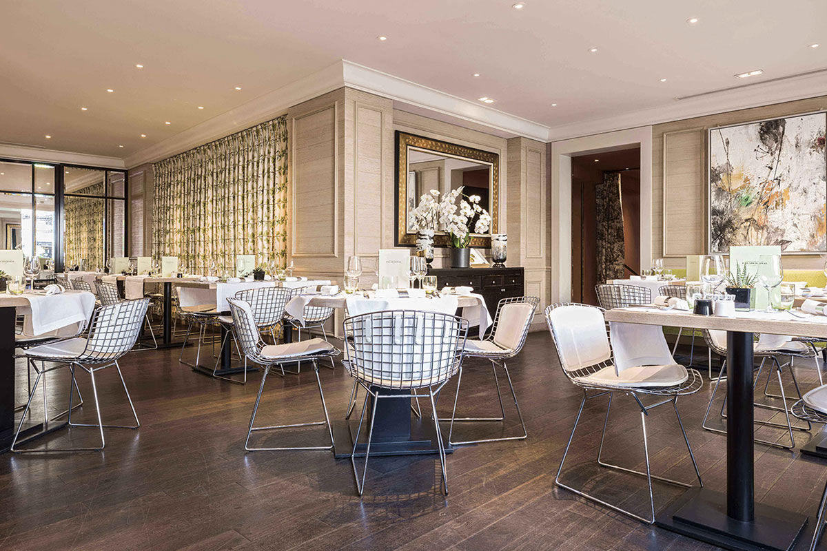 <b>Grand Hotel du Palais Royal</b> - Set opposite the Palais Royal and only a 2-minute walk to the Musee du Louvre, this posh hotel is centrally located for strolls down the Parisian streets. The Grand Hotel du Palais Royal is set within an 18th century building, making it the perfect home for its bright, luxe rooms and champagne toasts.