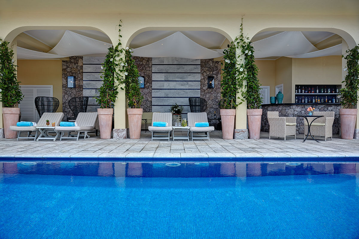 <b>Belmond Villa Sant’Andrea, Taormina</b> - Bright and airy, this 1830s hotel on Mazzaro Bay features cabanas lining their private beach and a pool overlooking the ocean. It is easy refinement meets glossy beach chic with a hint of Old-World glamor.