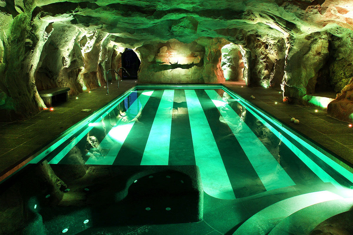 <b>Relais & Chateaux Castello di Guarene</b> - Set on a hill overlooking the lush landscape, this 18th century palace is striking in appearance. With a stately garden and an underground cave pool to enjoy, guests feel the grandeur and splendor of Old-World luxury.