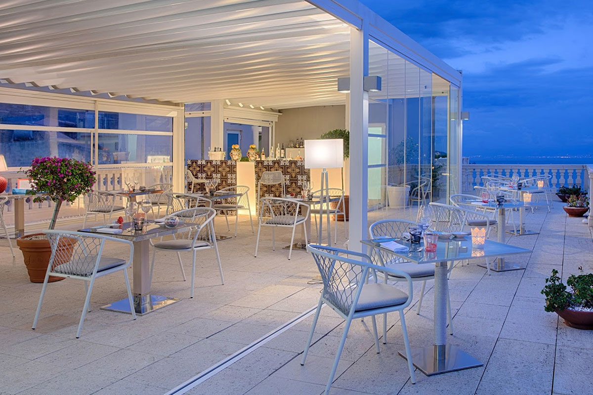 <b>NH Collection Taormina</b> - Modern and cool, the NH Collection Taormina features a roof-top terrace, cocktail bar and panoramic view of the Sicilian coast. The early 20th century architecture is stylish and adds to the polished Mediterranean feel.