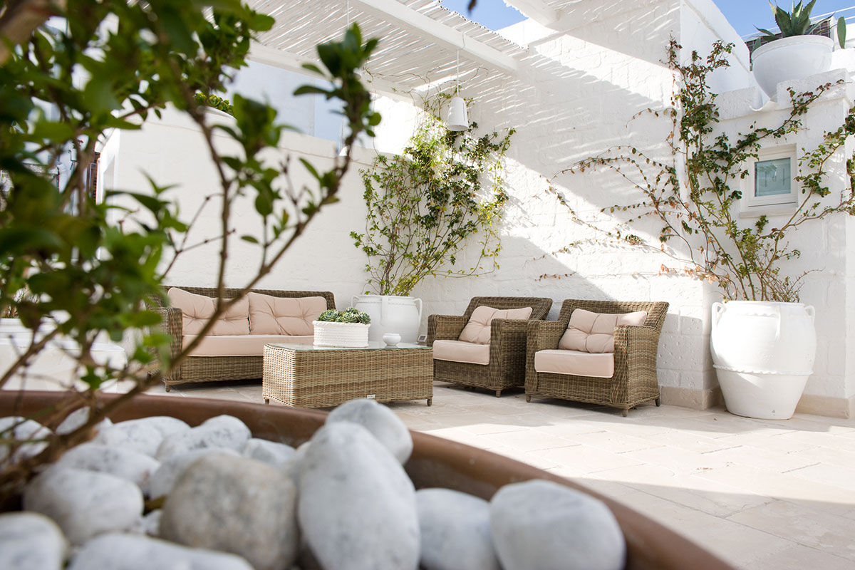 <b>Don Ferrante Dimore di Charme, Monopoli</b> - Once a fortress of the 16th century Castello Carlo V, this sprawling hotel has an airy feel within its whitewashed stone walls. Guests can create a tailormade itinerary to explore nearby cultural hot spots or take a more relaxing approach with a terrace sun lounger near the refreshing pool.