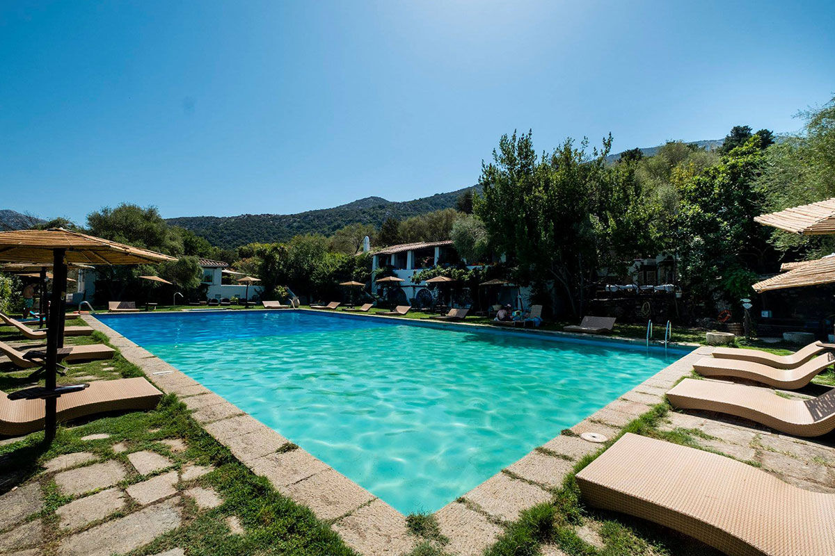 <b>Experience Hotel Su Gologone</b> - Hotel Su Gologone is the perfect escape for those who appreciate local art, food, wine and culture. Surrounded by the Supramonte mountaintops, this hotel has stunning sunset views; it hosts expert artists teaching classes on site, and showcases the bright colors and textiles of regional Sardinian crafts.