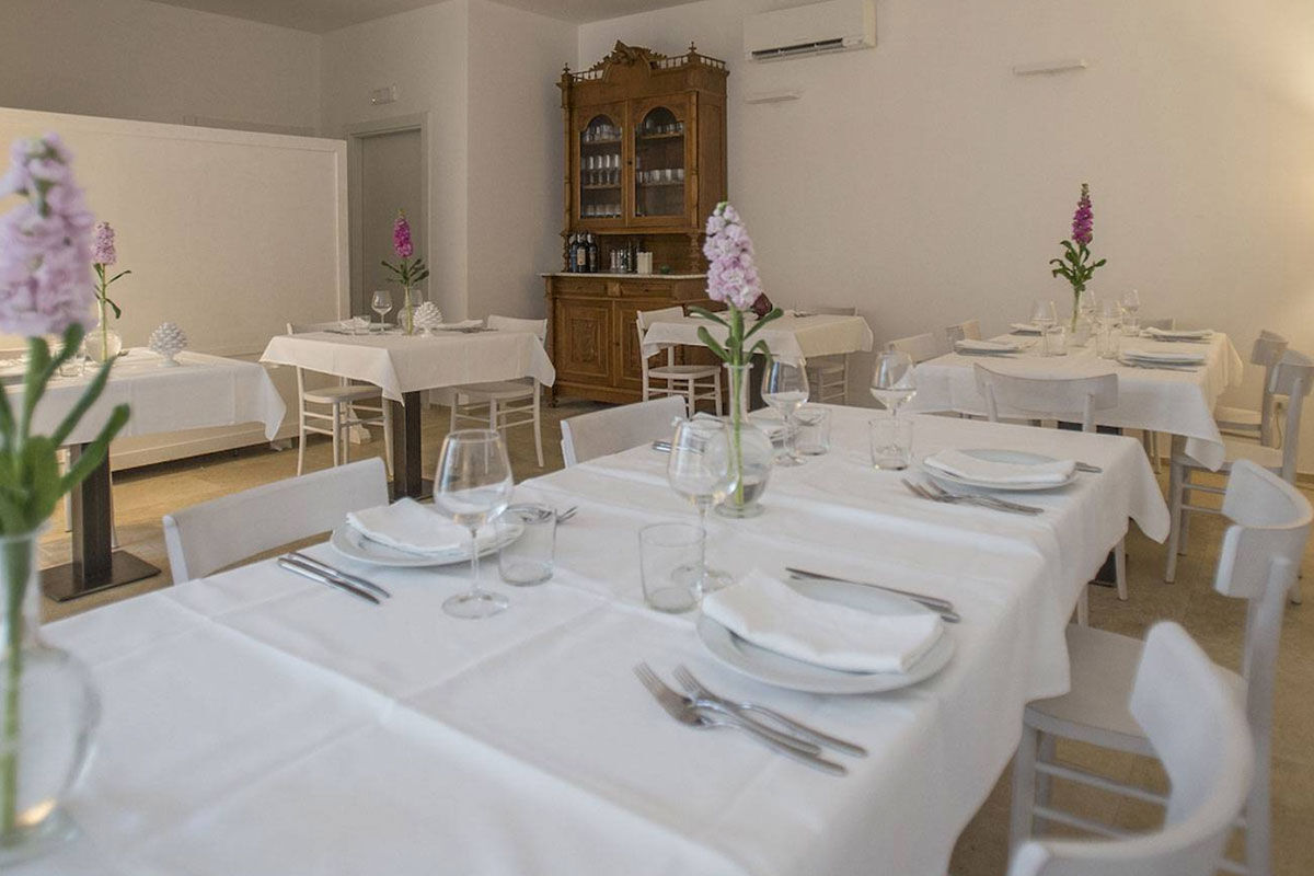 <b>Masseria Mongio Dell'Elefante, Otranto</b> - Although off the beaten track and surrounded by fields, the Masseria Mongio Dell’Elefante is only a 1-minute walk to Baia dei Turchi beach. Featuring exposed stone and recycled wood, this traditional farmhouse-turned-boutique hotel has an elegant charm to ease you into your vacation.