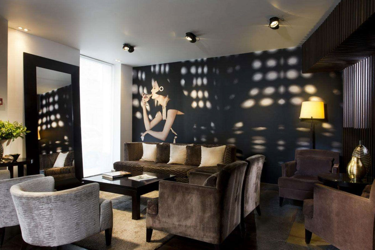 <b>La Villa Saint Germain Des Prés</b> - With a sleek vibe and refined detailing in the individually styled rooms, guests feel a sense of whimsy during their stay at La Villa Saint Germain Des Pres. The spiraling staircase leads down to the modern dining area, and the lounge has a sophisticated bar.