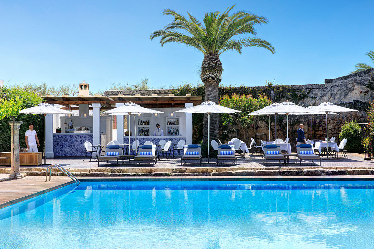 <b>Masseria Torre Maizza, Savelletri</b> - Looking over the surrounding olive groves to the Adriatic Sea, this whitewashed hotel is a renovated 16th century masseria. The restaurant uses local ingredients, the property boasts a private beach club, spa, and golf course, and you’re only a short shuttle away from the quaint fishing town of Savelletri.