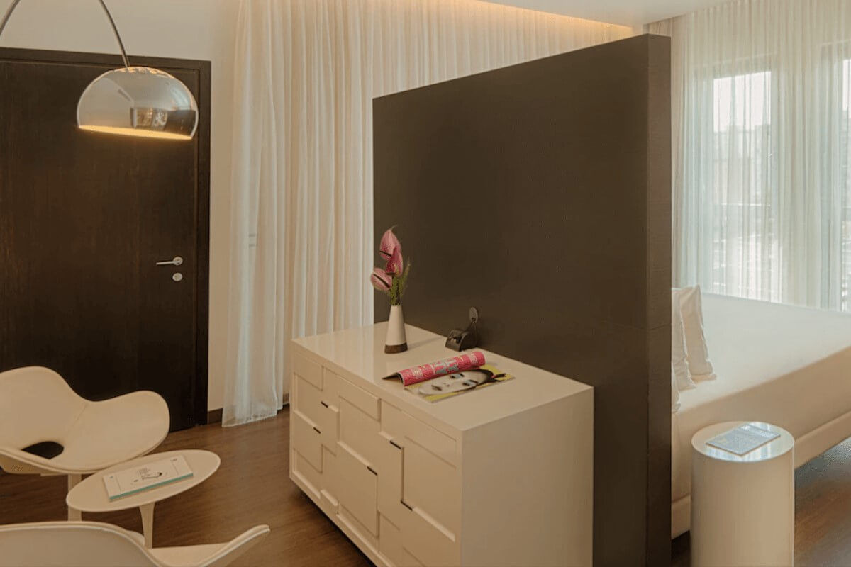 <b>nhow Milano</b> - With eclectic furniture, a colorful palette, and a chic restaurant serving up regional cuisine, this landmark hotel sure is trendy! Located in Zona Tortona (Milan’s design district) it seems only fitting that they have modernist art exhibitions featured right in their lobby (rotating every 6 months).