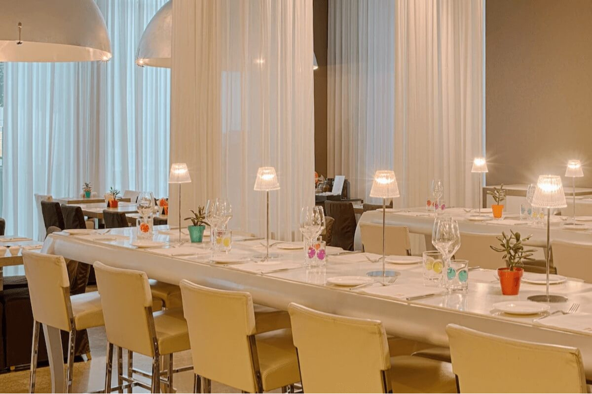 <b>nhow Milano</b> - With eclectic furniture, a colorful palette, and a chic restaurant serving up regional cuisine, this landmark hotel sure is trendy! Located in Zona Tortona (Milan’s design district) it seems only fitting that they have modernist art exhibitions featured right in their lobby (rotating every 6 months).