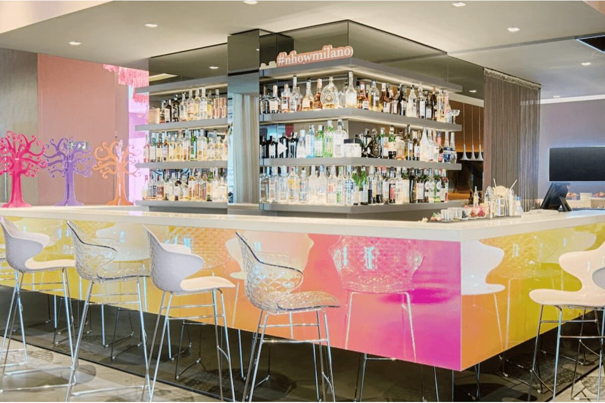 <b>nhow Milano</b> - With eclectic furniture, a colorful palette, and a chic restaurant serving up regional cuisine, this landmark hotel sure is trendy! Located in Zona Tortona (Milan’s design district) it seems only fitting that they have modernist art exhibitions featured right in their lobby (rotating every 6 months).