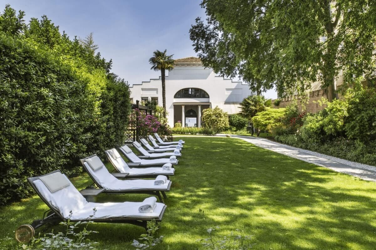 <b>NH Collection Venezia Grand Hotel Palazzo dei Dogi</b> - Be transported through time with the ornate architecture, antique décor, and period-style rooms of this refined boutique hotel. With a luxe bar, terrace restaurant, lush garden, and relaxing spa, this palazzo has all the polished sophistication you’d want in a historic Venetian hotel.