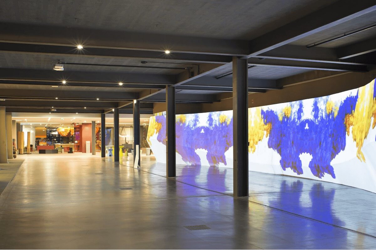 <b>nhow Milano</b> - With eclectic furniture, a colorful palette, and a chic restaurant serving up regional cuisine, this landmark hotel sure is trendy! Located in Zona Tortona (Milan’s design district) it seems only fitting that they have modernist art exhibitions featured right in their lobby (rotating every 6 months).